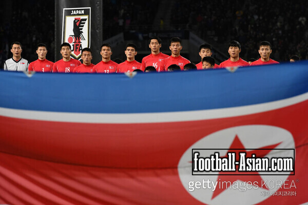 CHOFU, JAPAN - DECEMBER 09: North Korean players line up for the national anthem prior to the EAFF E-1 Men's Football Championship between Japan and North Korea at Ajinomoto Stadium on December 9, 2017 in Chofu, Tokyo, Japan. (Photo by Masashi Hara/Getty Images)