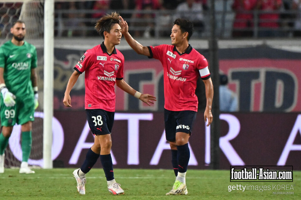 OSAKA, JAPAN - JULY 28: #38 Sota KITANO of Cerezo Osaka celebrates scoring his side's second goal with his teammate Shinji KAGAWA during the preseason friendly match between Cerezo Osaka and Paris Saint-Germain at Yanmar Stadium Nagai on July 28, 2023 in Osaka, Japan. (Photo by Kenta Harada/Getty Images)