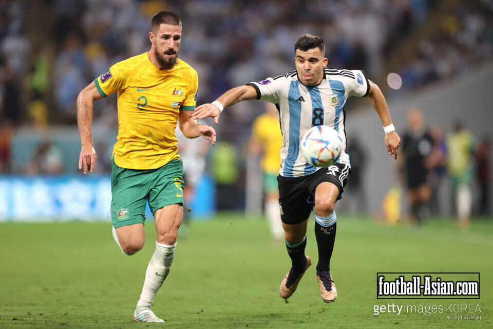 DOHA, QATAR - DECEMBER 03: Marcos Acuna of Argentina battles for possession with Milos Degenek of Australia during the FIFA World Cup Qatar 2022 Round of 16 match between Argentina and Australia at Ahmad Bin Ali Stadium on December 03, 2022 in Doha, Qatar. (Photo by Michael Steele/Getty Images)