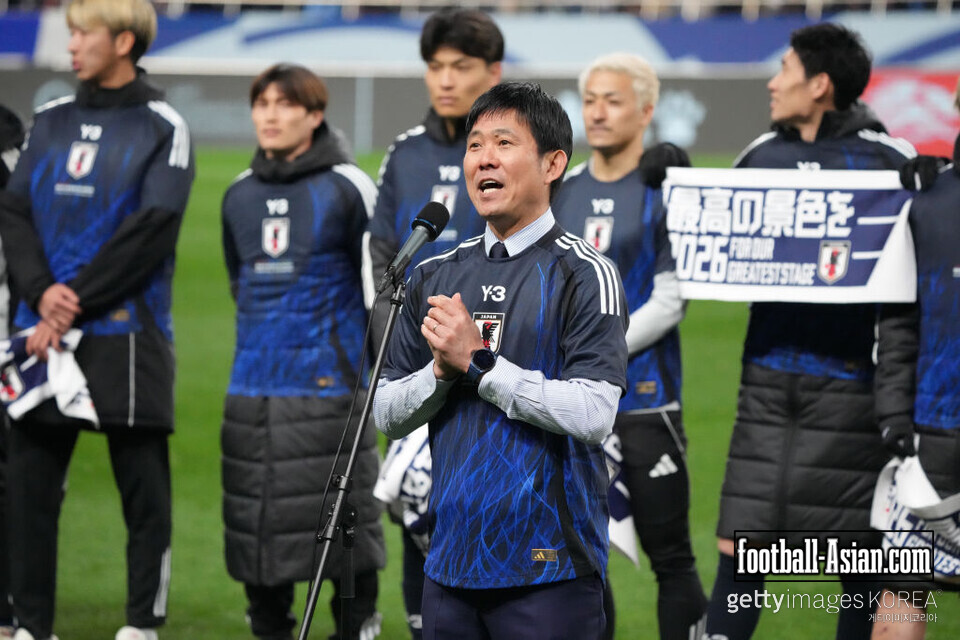 SAITAMA, JAPAN - MARCH 20: Head coach Hajime Moriyasu of Japan applauds fans as the team qualifies for the 2026 FIFA World Cup following the 2-0 victory in the FIFA World Cup Asian qualifier Group C match between Japan and Bahrain at Saitama Stadium on March 20, 2025 in Saitama, Japan. (Photo by Koji Watanabe/Getty Images)