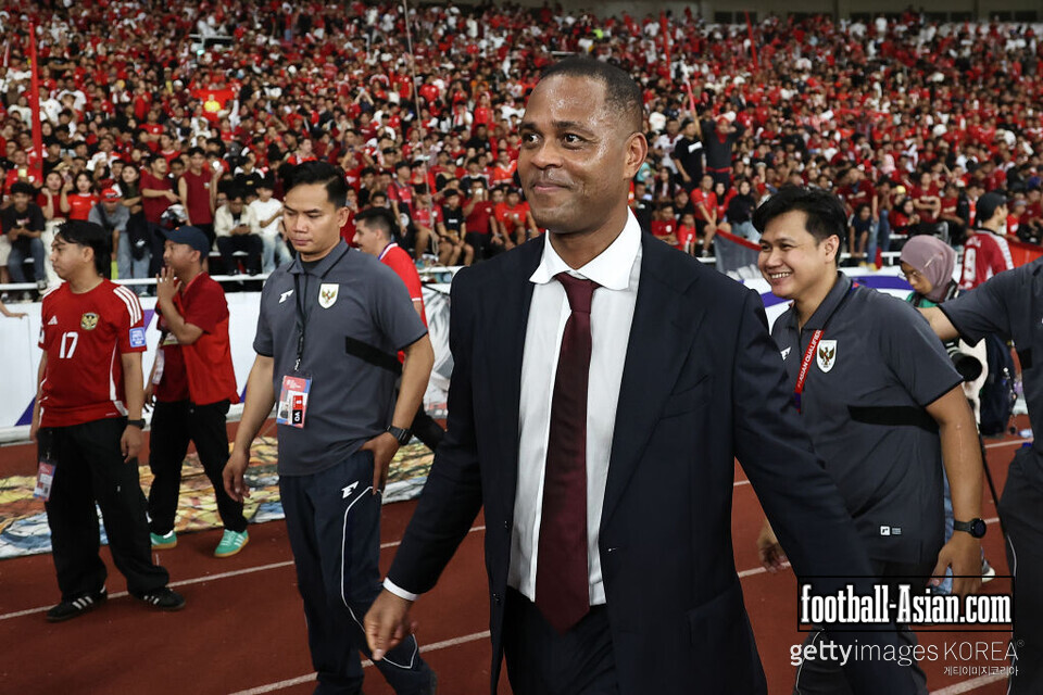 JAKARTA, INDONESIA - MARCH 25: Head coach Patrick Kluivert of Indonesia smiles after the FIFA World Cup qualifier Asian third round Group C match between Indonesia and Bahrain at Gelora Bung Karno Stadium on March 25, 2025 in Jakarta, Indonesia. (Photo by Robertus Pudyanto/Getty Images)