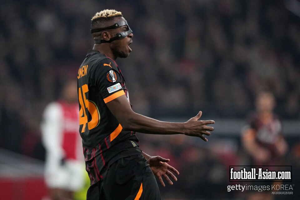 AMSTERDAM, NETHERLANDS - JANUARY 30: Victor Osimhen #45 Galatasaray reacts after missing a shot in the first half of the UEFA Europa League 2024/25 League Phase MD8 match between AFC Ajax and Galatasaray A.S. at Johan Cruijff Arena on January 30, 2025 in Amsterdam, Netherlands. (Photo by Alex Bierens de Haan/Getty Images)