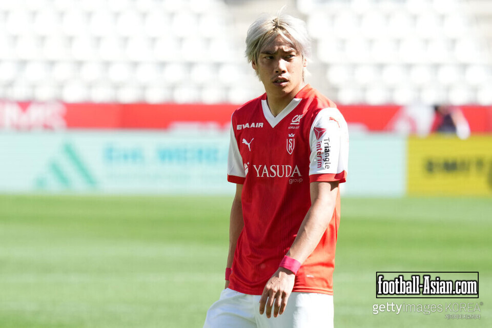 REIMS, FRANCE - AUGUST 10: Junya Ito of Stade Reims looks on during the pre-season friendly match between Stade de Reims and AJ Auxerre at Stade Auguste-Delaune on August 10, 2024 in Reims, France. (Photo by Koji Watanabe/Getty Images)
