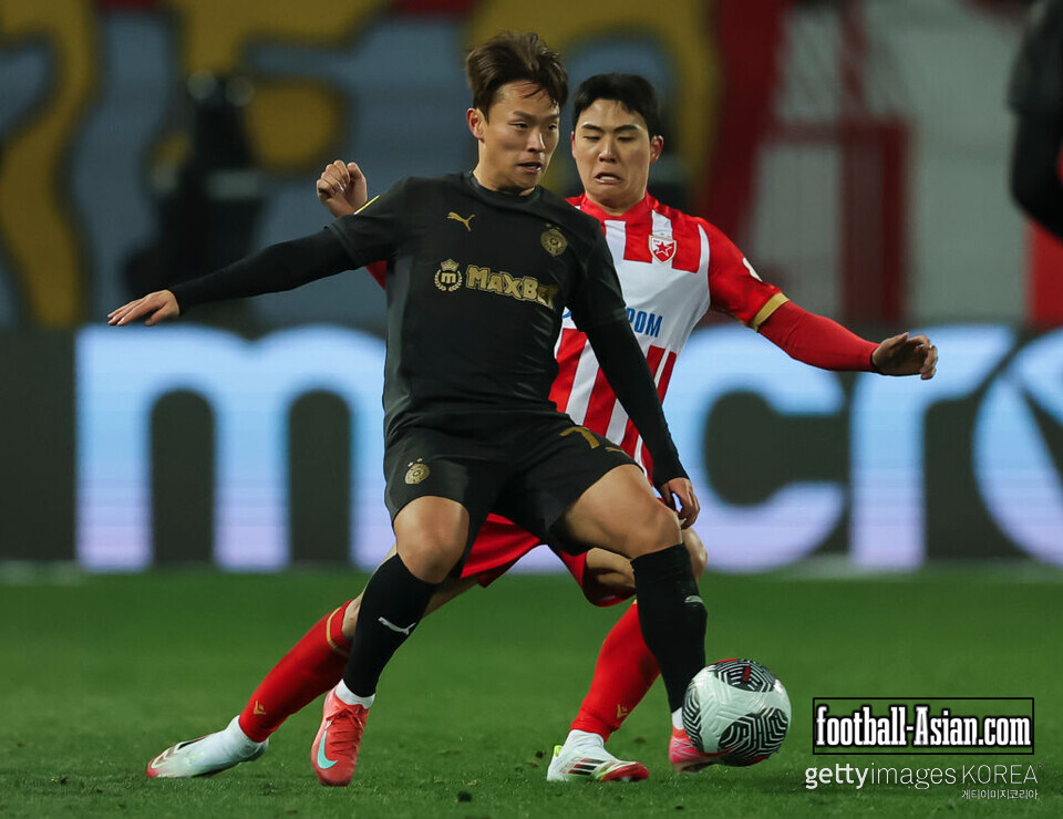 BELGRADE, SERBIA - FEBRUARY 22: Youngjun Goh (L) of Partizan in action against Seol Young-woo (R) of Crvena Zvezda during the Serbian SuperLiga season 2024/2025 match between Crvena Zvezda and Partizan at Rajko Mitic Stadium on February 22, 2025 in Belgrade, Serbia. (Photo by Srdjan Stevanovic/Getty Images)