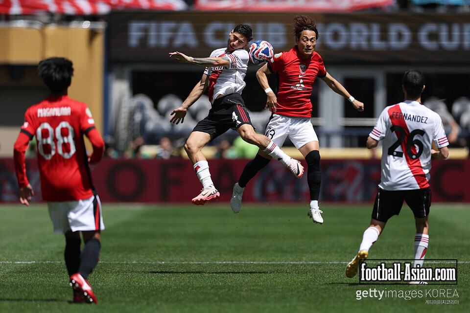 SEATTLE, WASHINGTON - JUNE 17: Gonzalo Montiel #4 of CA River Plate battles for a header against Ryoma Watanabe #13 of Urawa Red Diamonds during the FIFA Club World Cup 2025 group E match between CA River Plate and Urawa Red Diamonds at Lumen Field on June 17, 2025 in Seattle, Washington. (Photo by Buda Mendes/Getty Images)