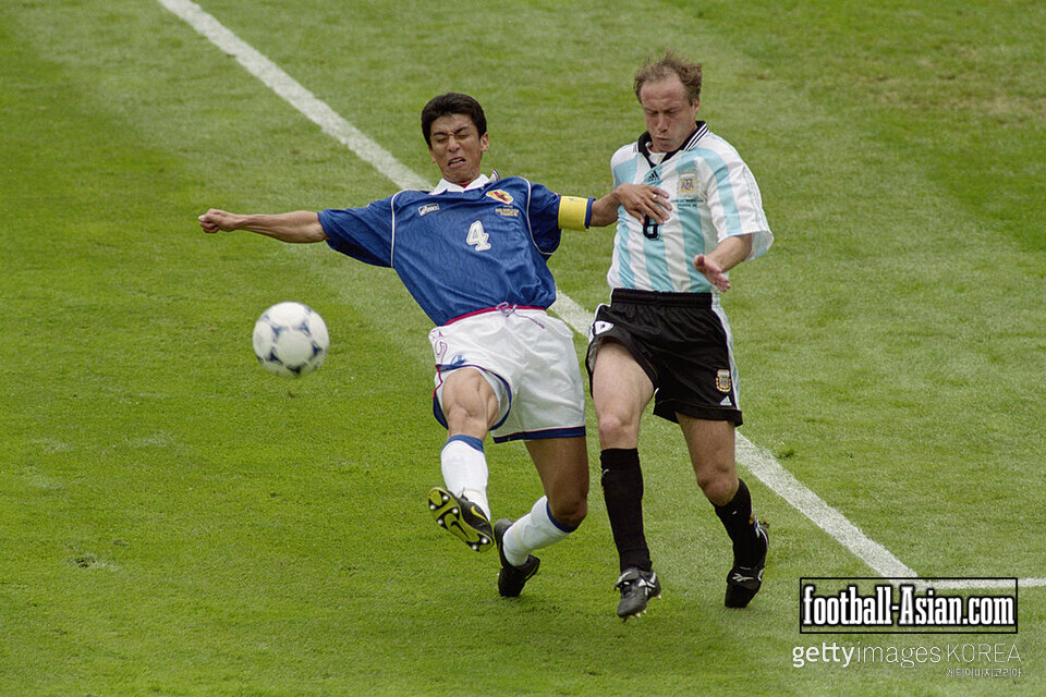 14 Jun 1998: Masami Ihara is challenged by Roberto Sensini of Argentina during the World Cup group H game at the Stade Municipal in Toulouse, France. Argentina won 1-0. \ Mandatory Credit: Laurence Griffiths /Allsport