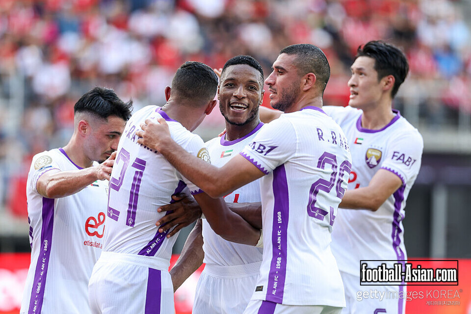 WASHINGTON, DC - JUNE 26: Kodjo Laba #9 of Al Ain FC celebrates scoring his team's first goal on a penalty kick with Soufiane Rahimi #21, Ramy Rabia #25 and Park Yongwoo #5 of Al Ain FC during the FIFA Club World Cup 2025 group G match between Wydad AC and Al Ain FC at Audi Field on June 26, 2025 in Washington, DC. (Photo by Kevin C. Cox/Getty Images)