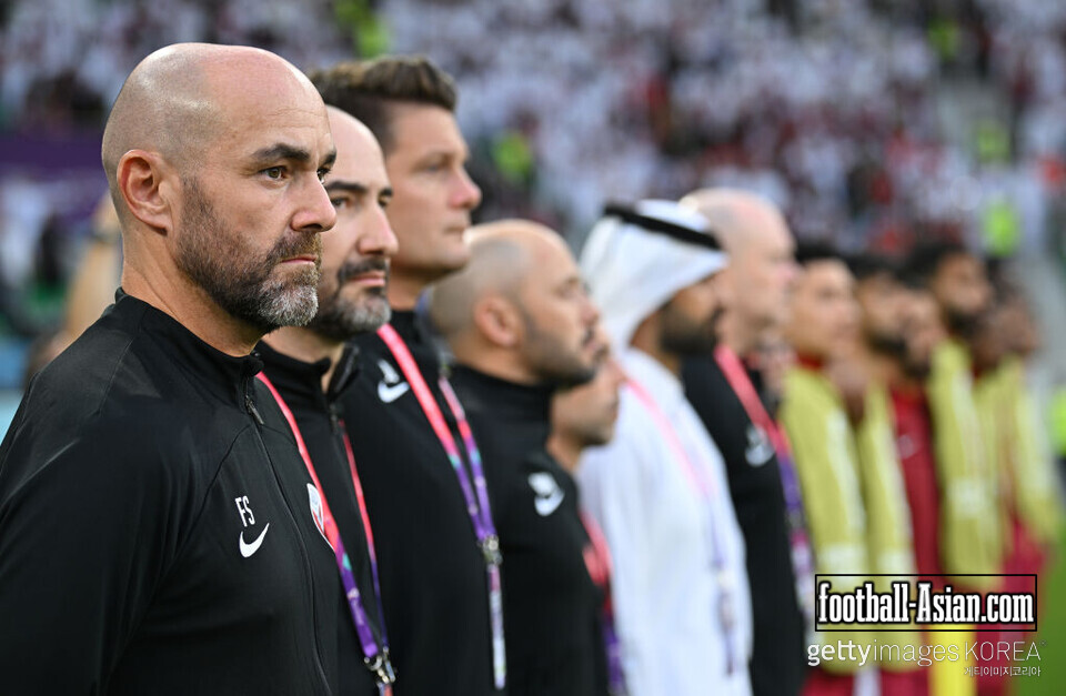 DOHA, QATAR - NOVEMBER 25: Felix Sanchez, head coach of Qatar lines up with his assistants prior to the FIFA World Cup Qatar 2022 Group A match between Qatar and Senegal at Al Thumama Stadium on November 25, 2022 in Doha, Qatar. (Photo by Stuart Franklin/Getty Images)