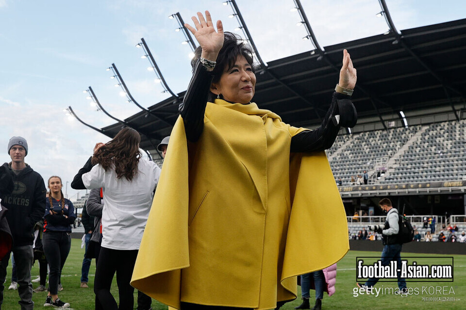 LOUISVILLE, KENTUCKY - NOVEMBER 20: Washington Spirit part owner Y. Michele Kang waves to spectators following the NWSL Championship held at Lynn Family Stadium on November 20, 2021 in Louisville, Kentucky. Washington Spirit defeated Chicago Red Stars 2-1 to win the championship. (Photo by Tim Nwachukwu/Getty Images)