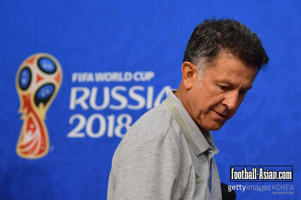 SAMARA, RUSSIA - JULY 01: Juan Carlos Osorio, coach of Mexico, looks on during a press conference at Samara Arena ahead of the Round of Sixteen match against Brazil on July 1, 2018 in Samara, Russia. (Photo by Hector Vivas/Getty Images)