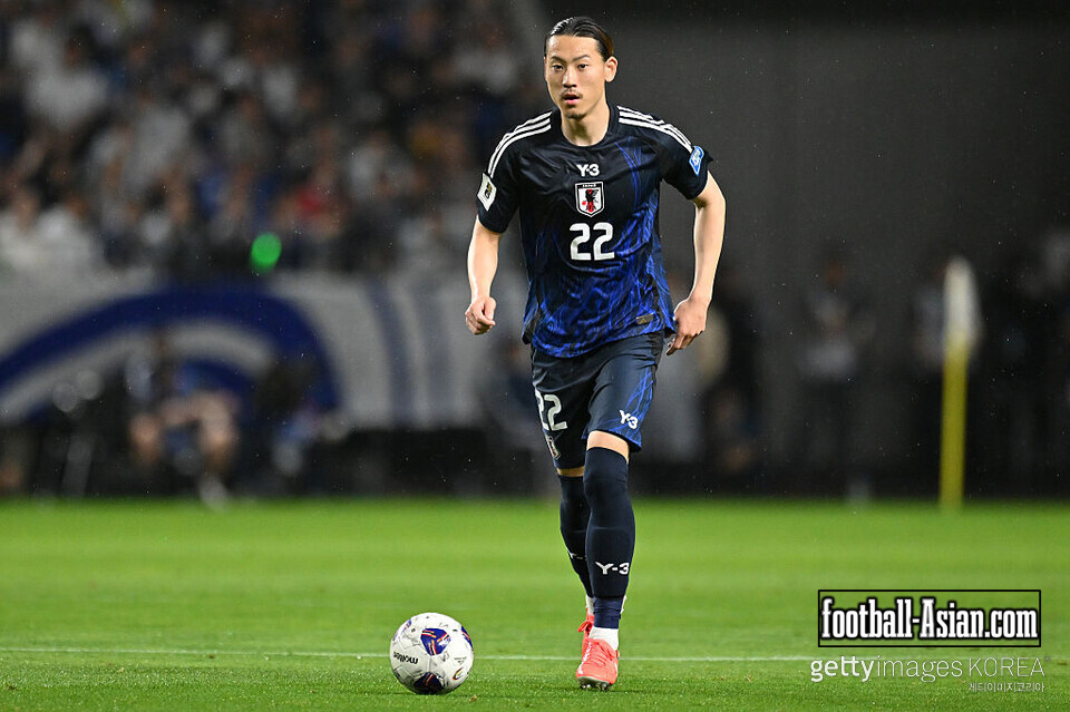 SUITA, JAPAN - JUNE 10: Ayumu Seko of Japan runs with the ball during the FIFA World Cup Asian Third Qualifier Group C match between Japan and Indonesia at Panasonic Stadium Suita on June 10, 2025 in Suita, Osaka, Japan. (Photo by Kenta Harada/Getty Images)