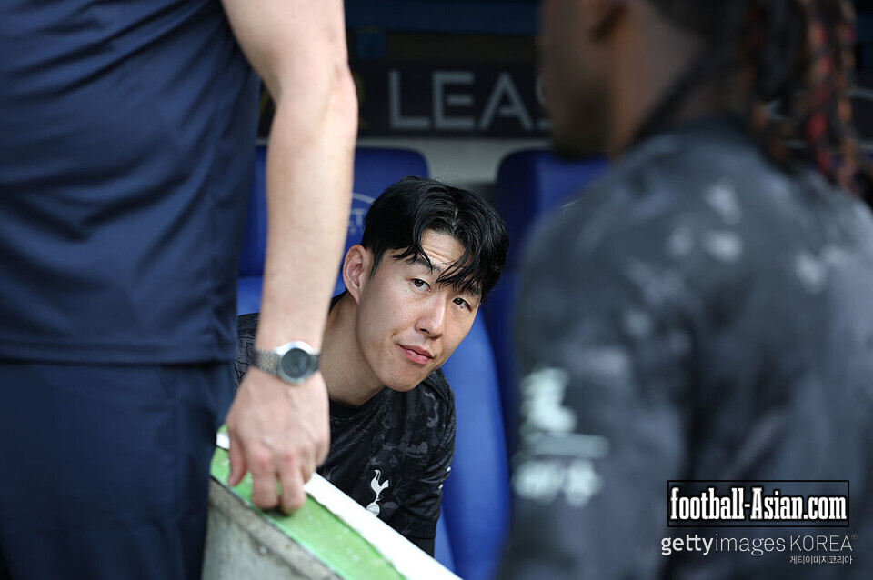 READING, ENGLAND - JULY 19: Heung-Min Son of Tottenham Hotspur looks on from the bench during the pre-season friendly match between Reading and Tottenham Hotspur at Select Car Leasing Stadium on July 19, 2025 in Reading, England. (Photo by Ryan Pierse/Getty Images)