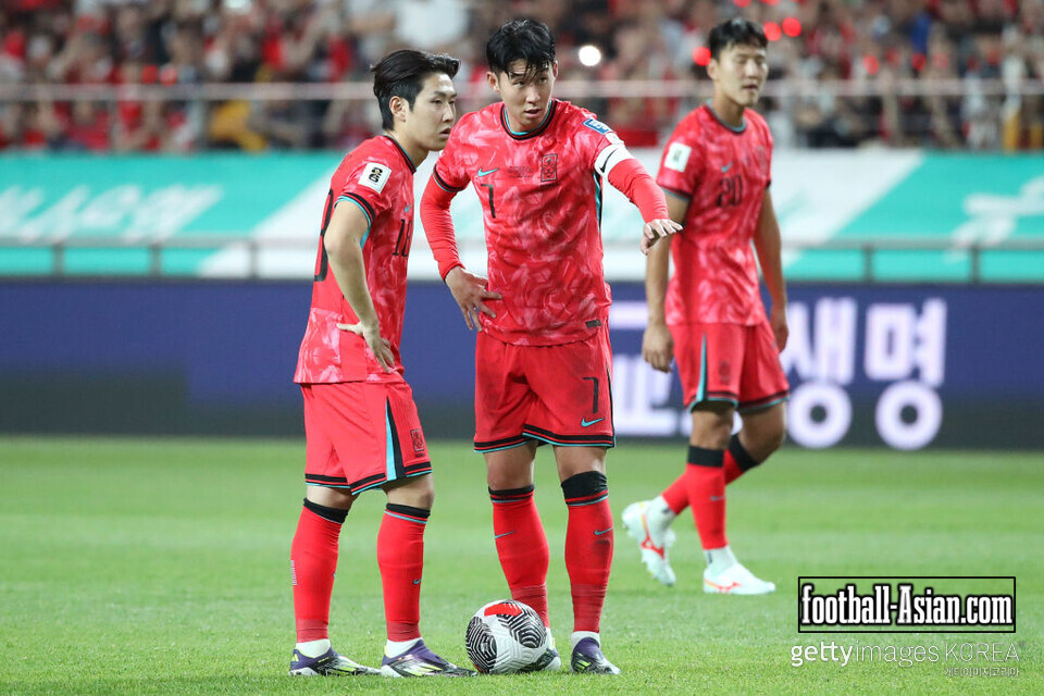 SEOUL, SOUTH KOREA - JUNE 11: Son Heung-min and Lee Kang-in of South Korea talk before a free kick during the FIFA World Cup Asian second qualifier Group C match between South Korea and China at Seoul World Cup Stadium on June 11, 2024 in Seoul, South Korea. (Photo by Chung Sung-Jun/Getty Images)
