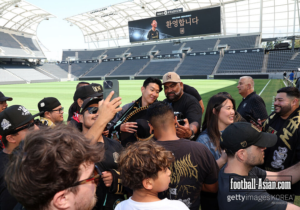 LOS ANGELES, CALIFORNIA - AUGUST 6: Son Hueng-Min of Los Angeles Football Club greets The 3252 supporter group after he was introduced at BMO Stadium on August 6, 2025 in Los Angeles, California. (Photo by Kevork Djansezian/Getty Images)