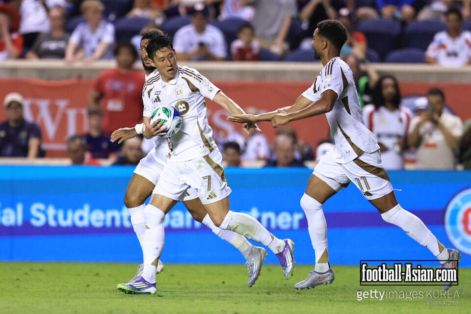 BRIDGEVIEW, ILLINOIS - AUGUST 09: Son Heung-Min #7 of Los Angeles FC and teammate Timothy Tillman #11 celebrates after the team's second goal during the MLS match between Chicago Fire FC and Los Angeles Football Club at SeatGeek Stadium on August 09, 2025 in Bridgeview, Illinois. (Photo by Geoff Stellfox/Getty Images)