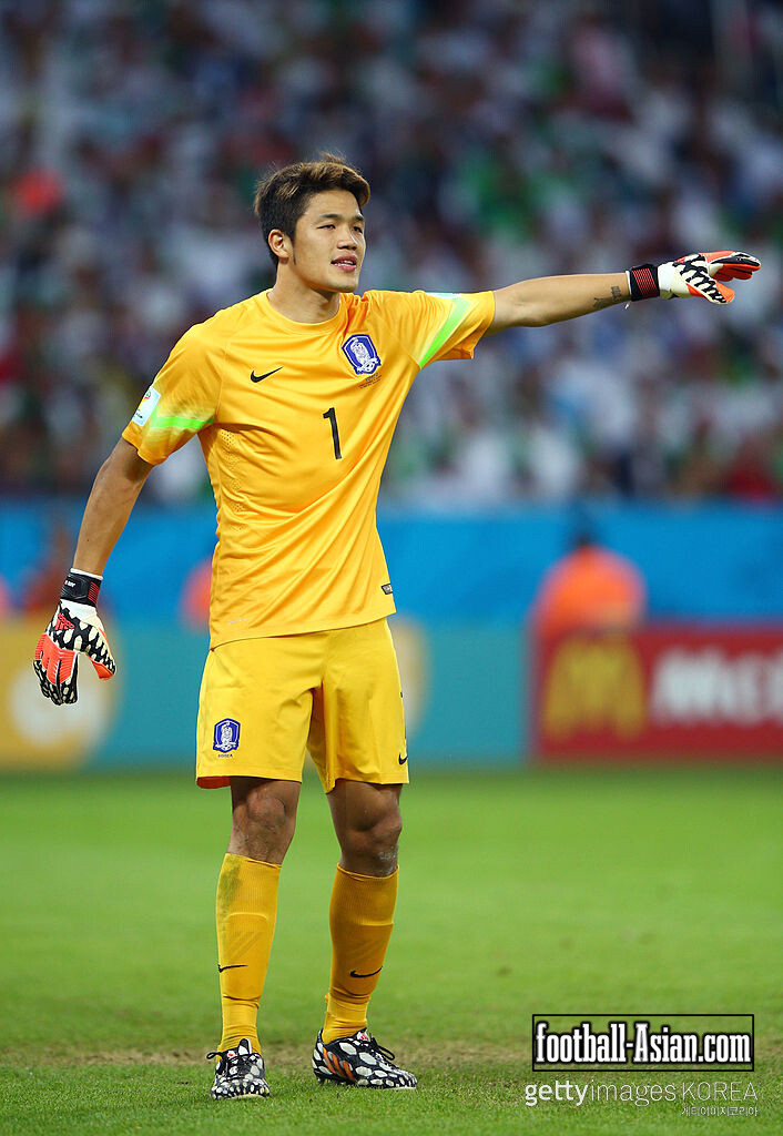 PORTO ALEGRE, BRAZIL - JUNE 22: Jung Sung-Ryong of South Korea gestures during the 2014 FIFA World Cup Brazil Group H match between South Korea and Algeria at Estadio Beira-Rio on June 22, 2014 in Porto Alegre, Brazil. (Photo by Ian Walton/Getty Images)